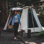 women enjoying outdoors with dog