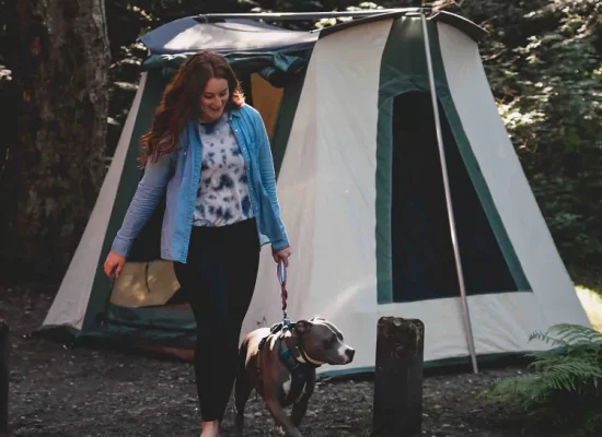 women enjoying outdoors with dog