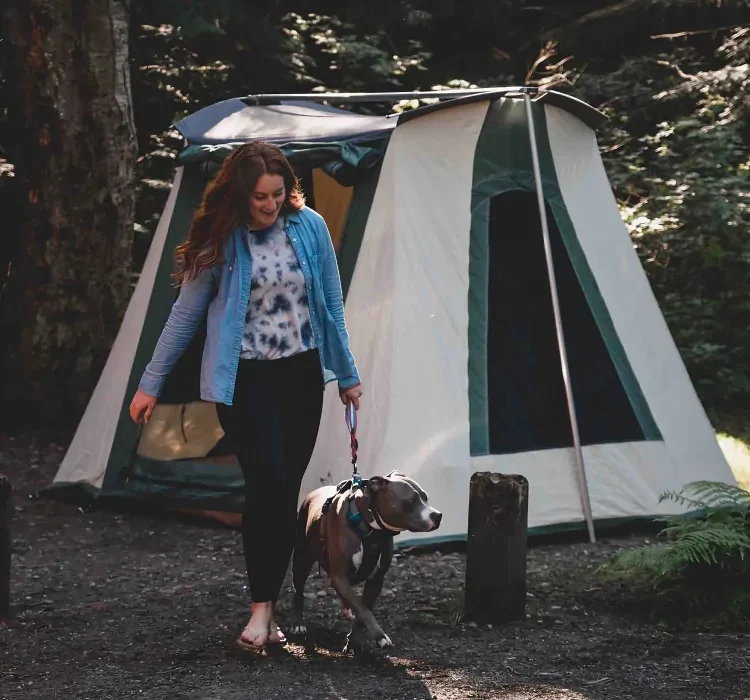 women enjoying outdoors with dog