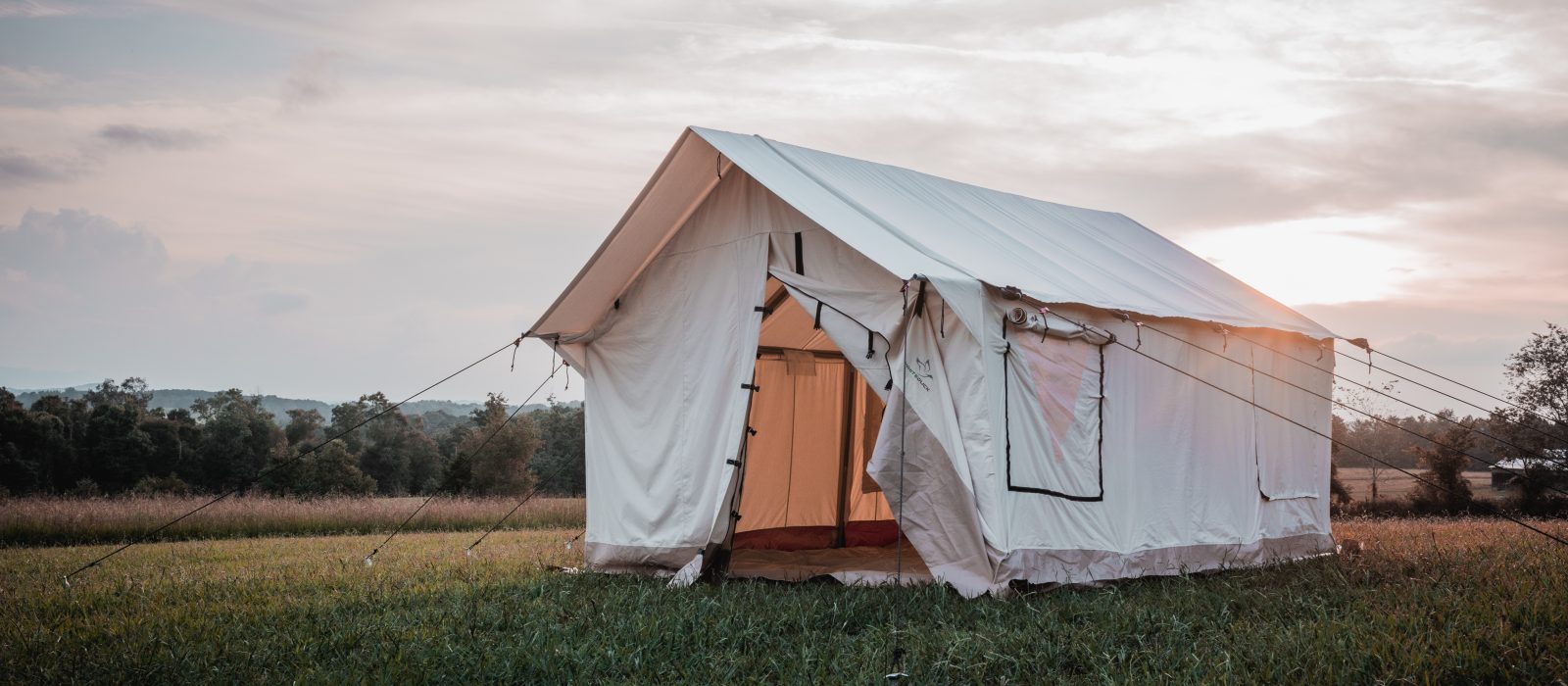 canvas wall tent setup in nature