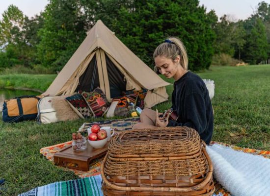 women enjoying evening snacks in camping