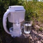 purifying dirty water in outdoors