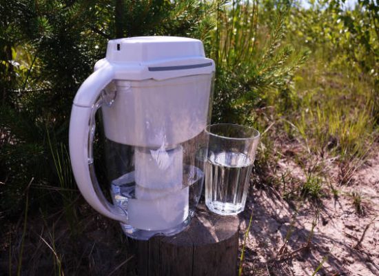 purifying dirty water in outdoors