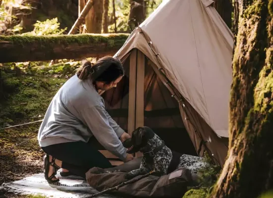 women and dog enjoying outdoors