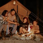 family enjoying overnight camping