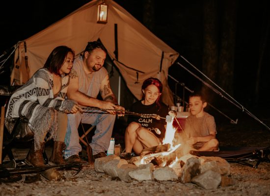 family enjoying overnight camping