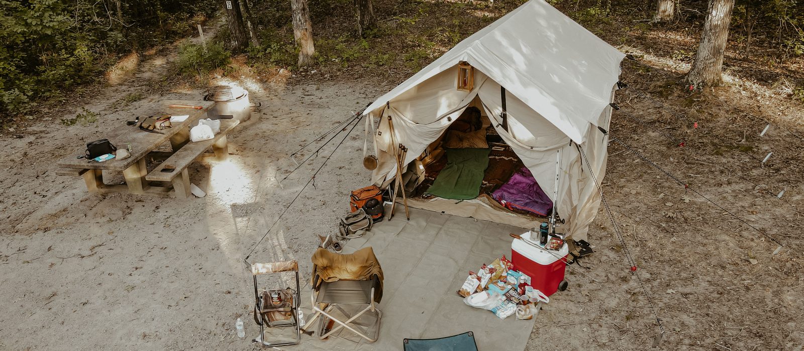 family enjoying camping with wall tent
