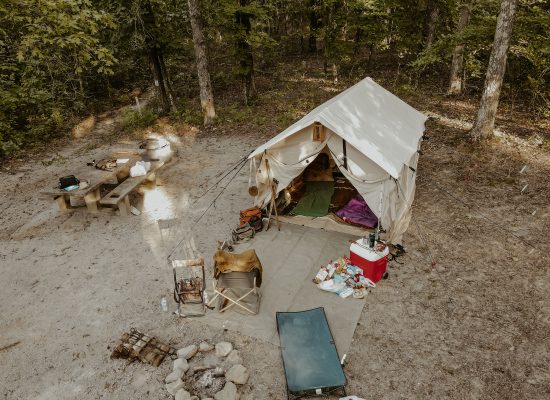 family enjoying camping with wall tent