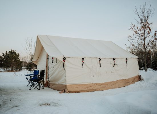 wall tent setup in snow for the winter camping