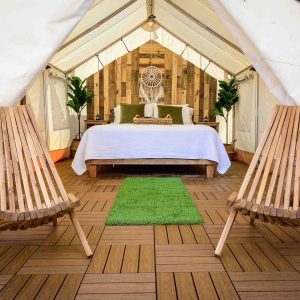 spacious wall tent with bed for sleep
