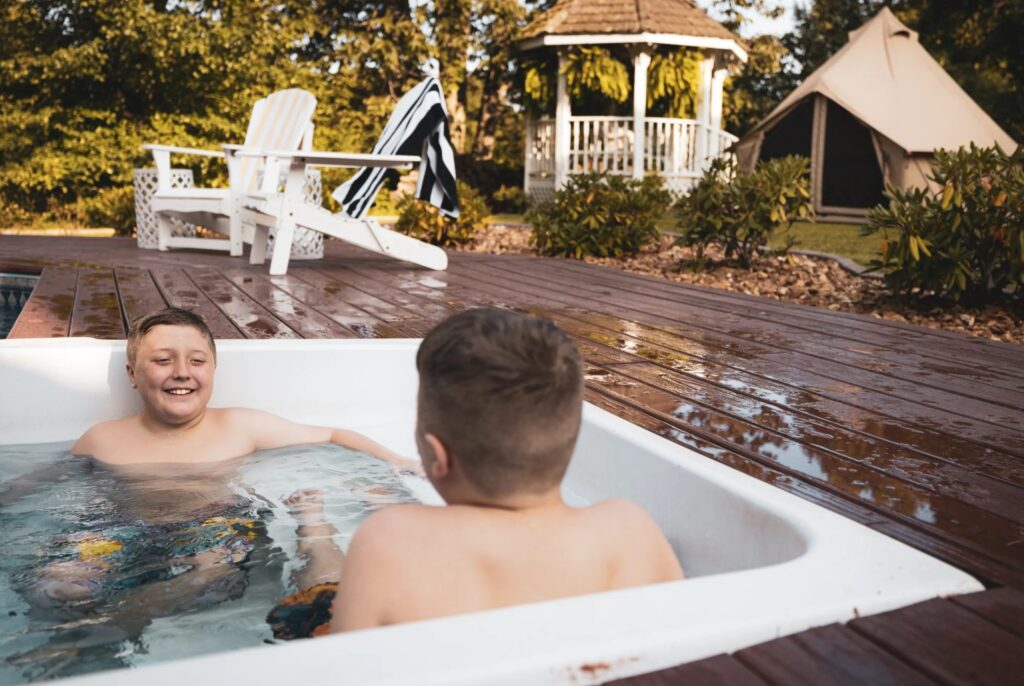 kids enjoying outdoors in bath tub