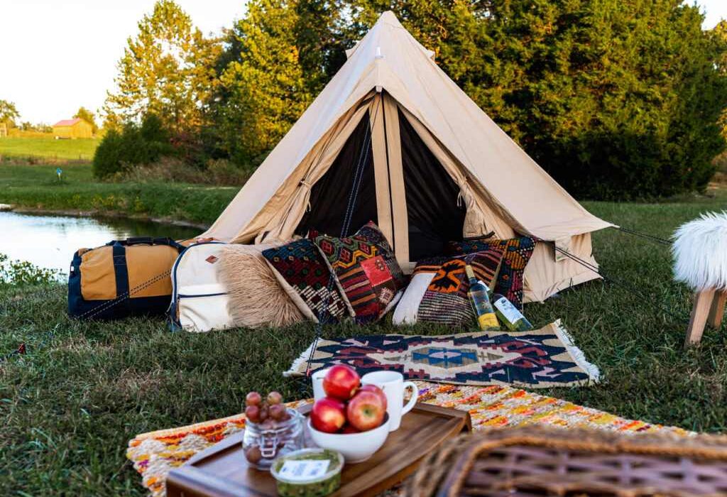 beautiful bell tent setup by the river