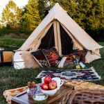 beautiful bell tent setup by the river