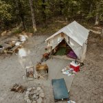 family enjoyin tent camping