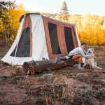 women enjoying solo camping with dog