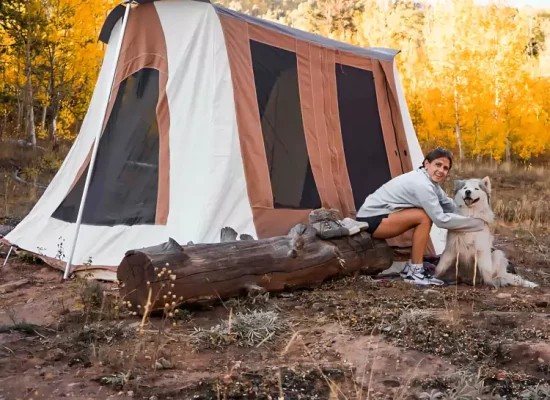 women enjoying solo camping with dog