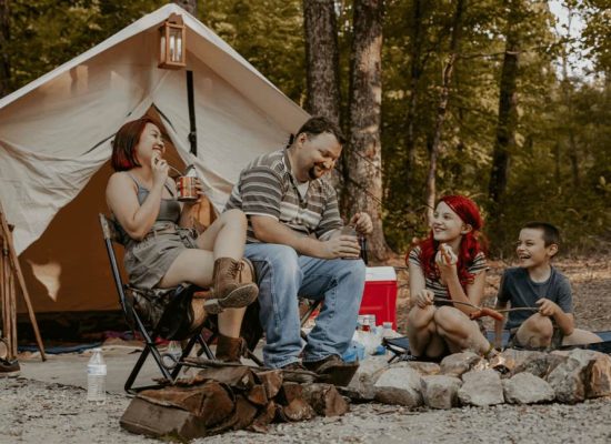family enjoying camping