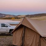 camping with canvas tent near the lake
