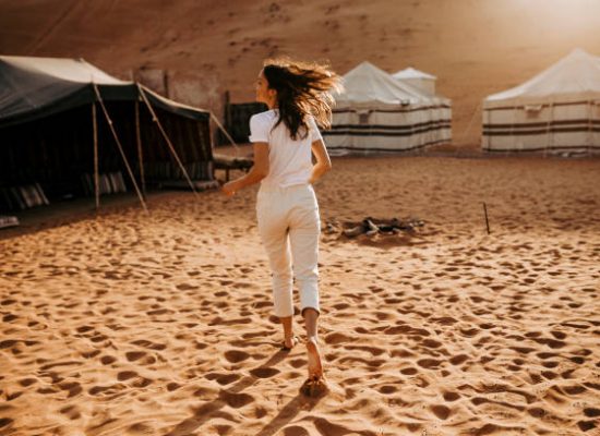 women enjoying desert camping