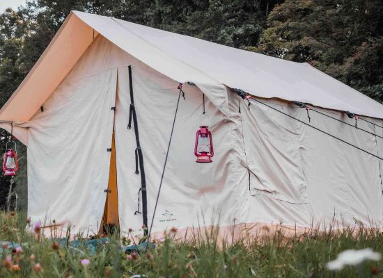 beautiful wall tent setup for camping in nature
