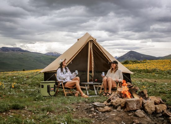 womens are enjoying camping in the nature