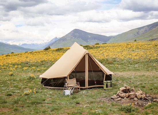 beautiful camp setup in plains with amazing mountain view