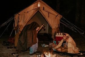 kids enjoying stories by the campfire