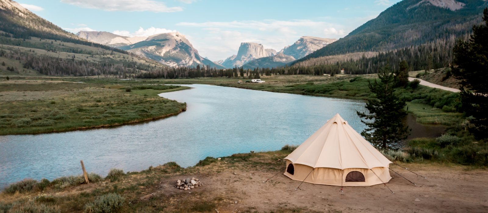 beautiful bell tent setup near the lake for perfect outdoor adventure