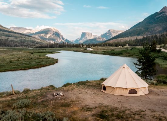 beautiful bell tent setup near the lake for perfect outdoor adventure