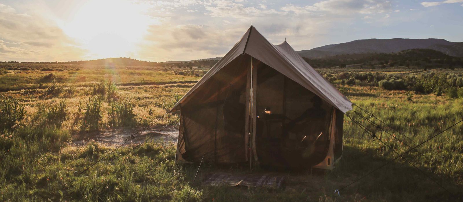 bell tent setup in beautiful plains for camping