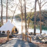 beautiful bell tent setup for glamping near the lake