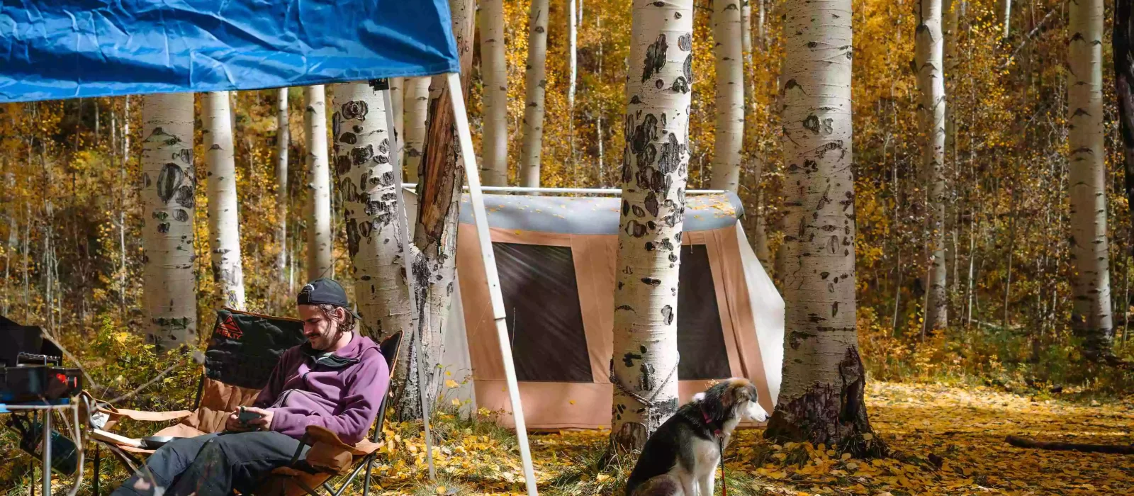Man enjoying outdoors - camping with 4 season cabin tent