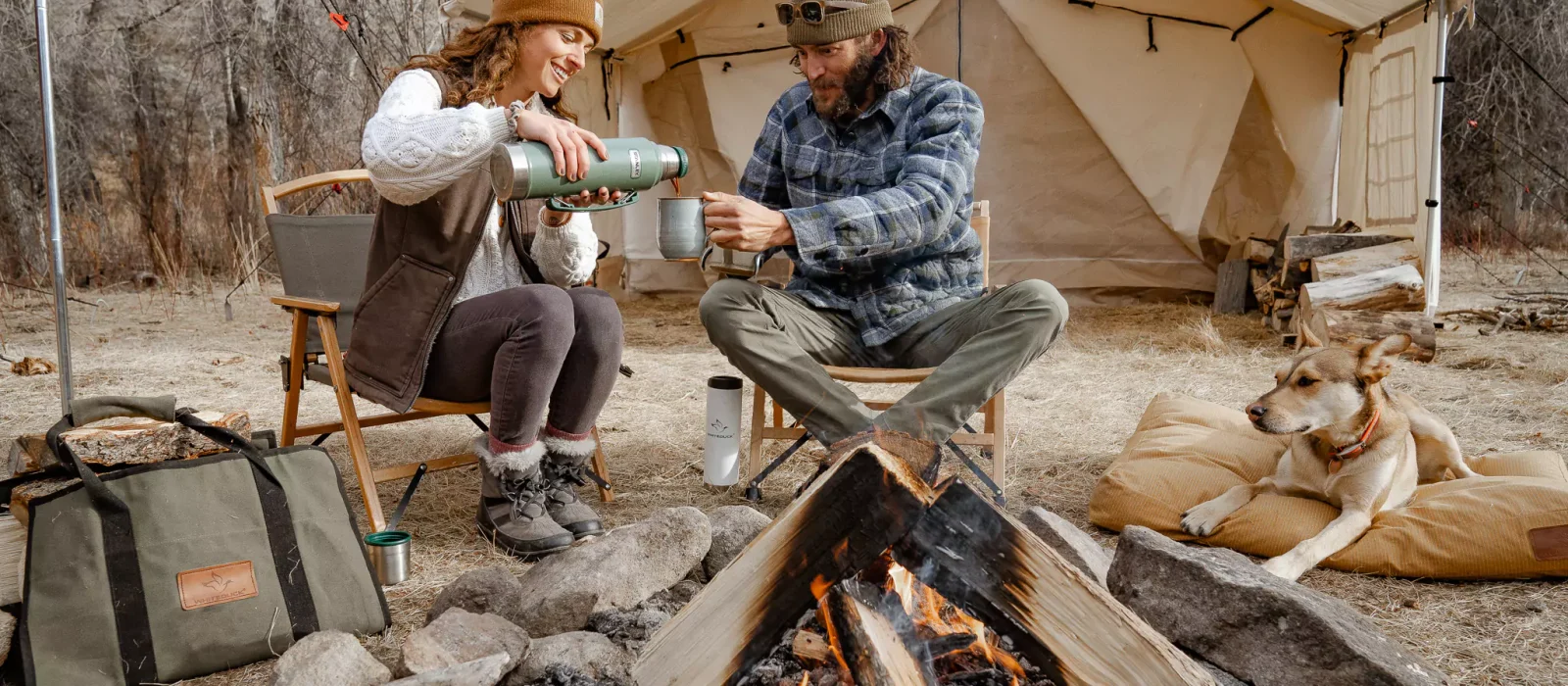couple enjoying coffee on their outdoor adventure