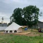 beautiful wall tent setup in backyard