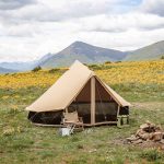 beautiful bell tent setup for camping in plains