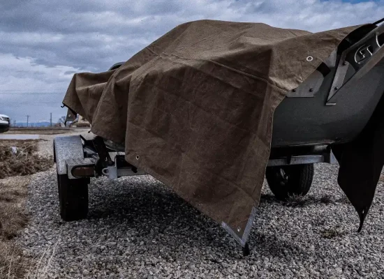 truck setup for camping shelter with tarp