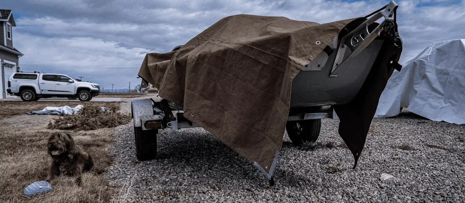 truck setup for camping shelter with tarp