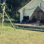wall tent setup in backyard for party