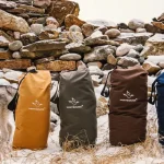 canvas duffel bags for camping in mountains - camping gear