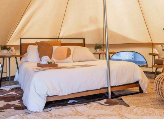 cozy tent setup like home for luxury glamping