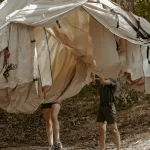 setting up tent frame for wall tent for camping