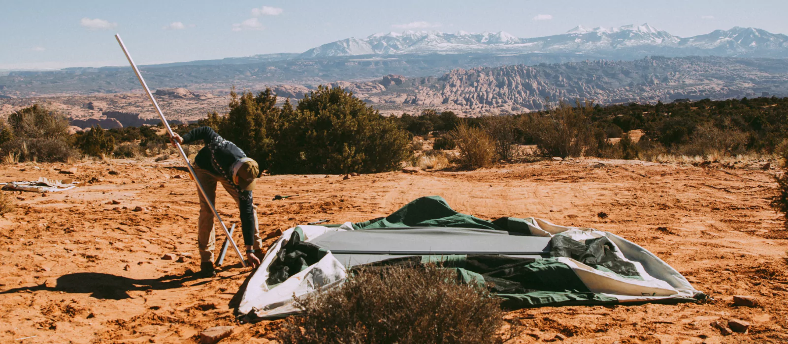 repairing tent screen of bell tent on camping