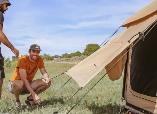 boys setting up a yurt tent for perfect outdoor dventure