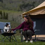 women enjoying outdoors with dog - yurt tent camping