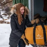 women using canvas bag for camping gear hacks