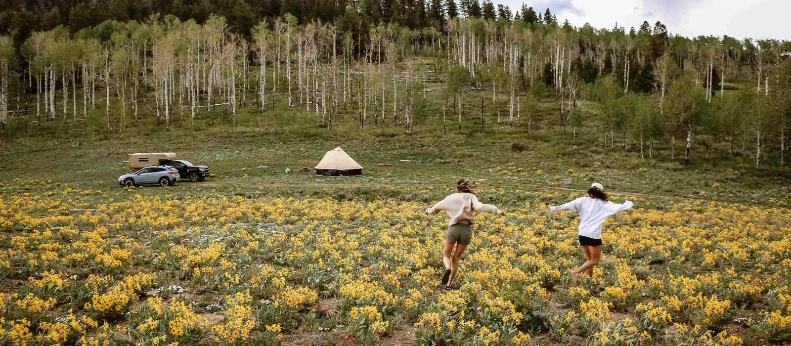 friends enjoying camping in colorado camping spot