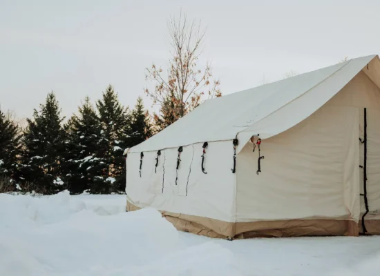 canvas tent heated with propone heater in snow