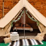 beautiful bell tent setup with accessories for perfect camping