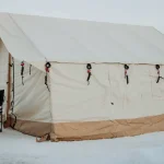 hot tent setup in snow for winter camping