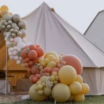 party tent setup with balloons for birthday event